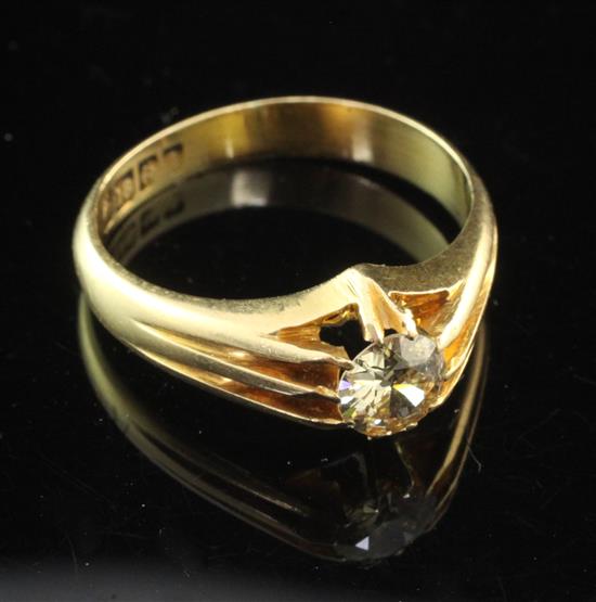 A George V 18ct gold and claw set solitaire diamond ring, size R.